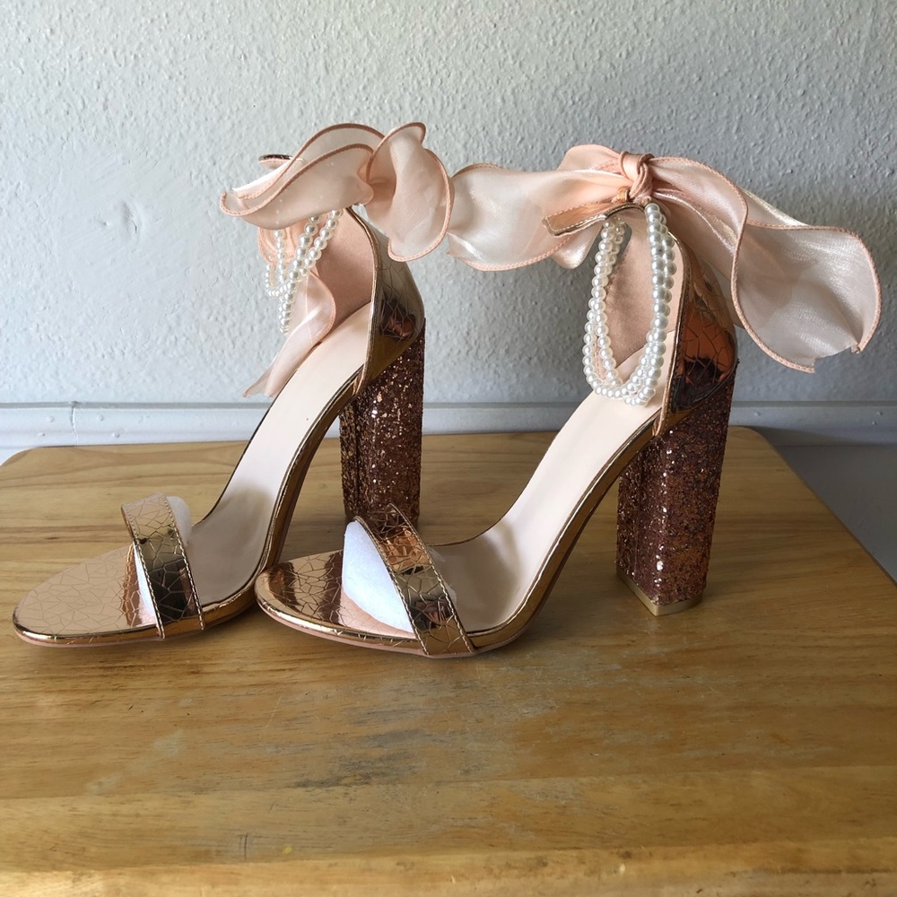 Brand new, NEVER WORN, wedding or event heels!! Peach colored not pink!!